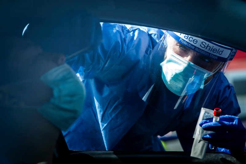 FILE -- Coronavirus testing at a site in Los Angeles on July 10, 2020. The pathogen has infected at least 4.3 million Americans, killing almost 150,000. (Jenna Schoenefeld/The New York Times)