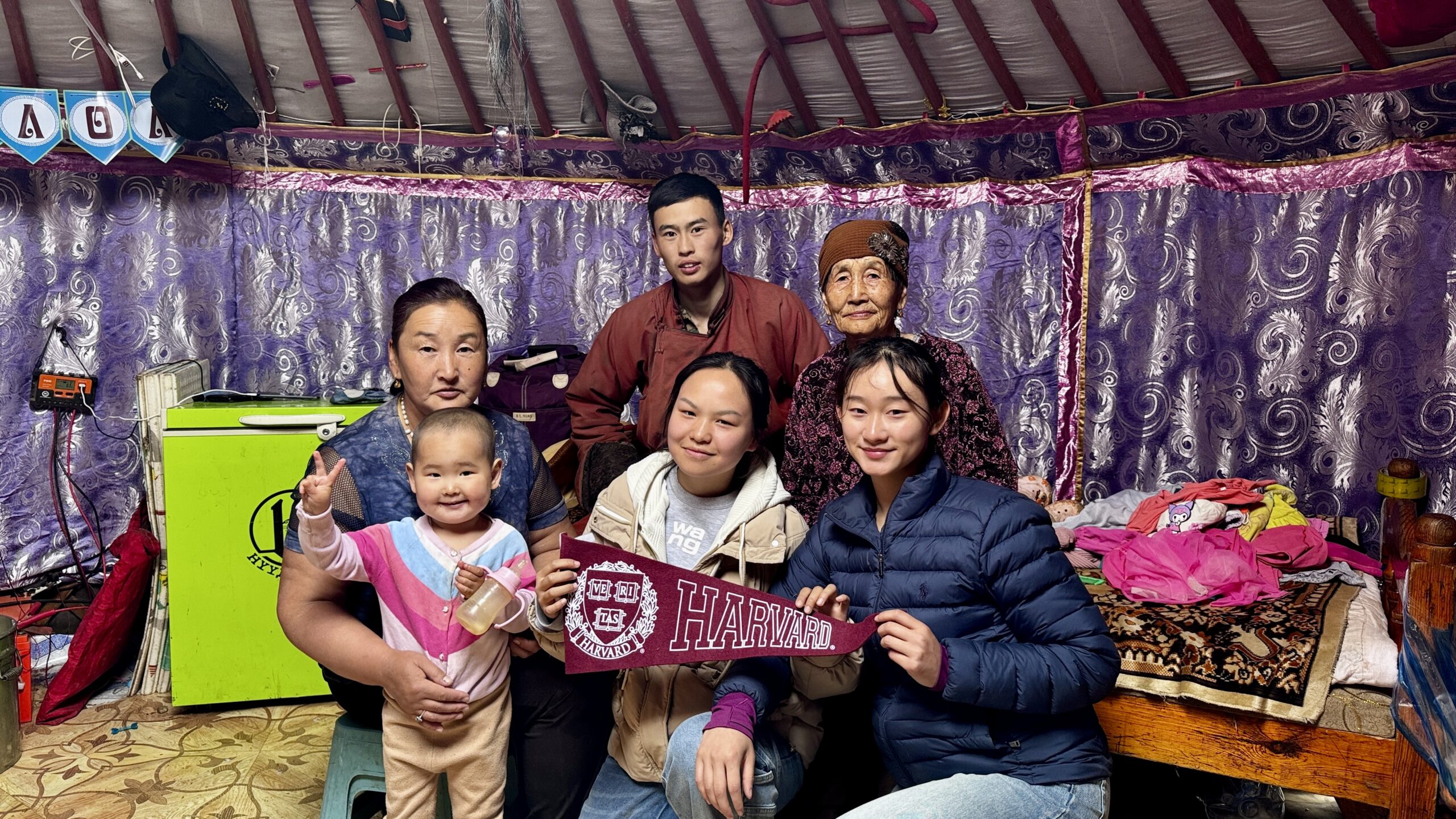 Student Tina Chen with family on her insternship.