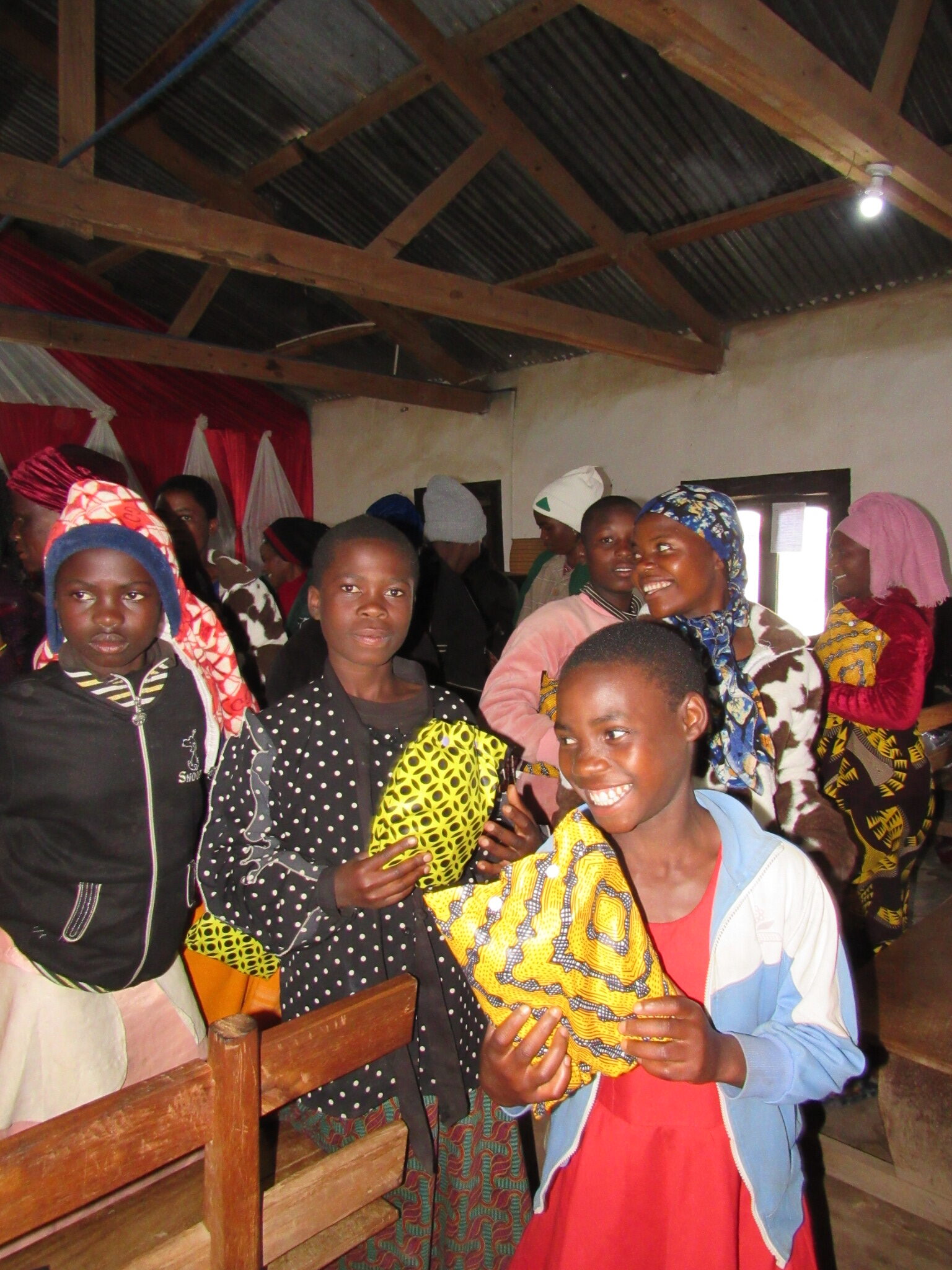 Picture of a group of people laughing.