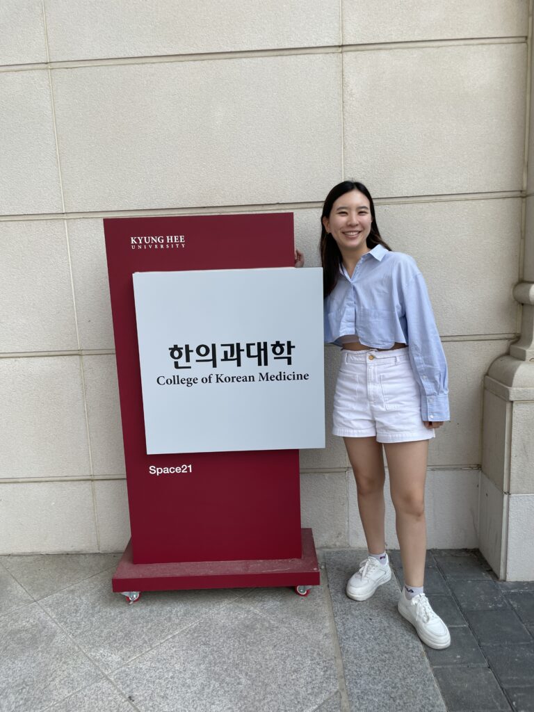 Picture of student Ye Won Ham with University Sign