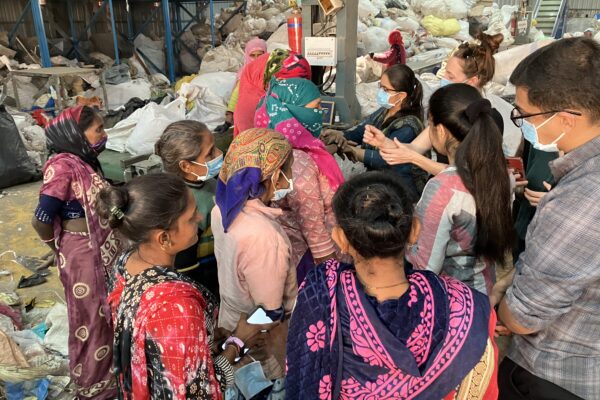 The Harvard team visits a ware recycling plant to understand the thermal comfort challenges the women face.