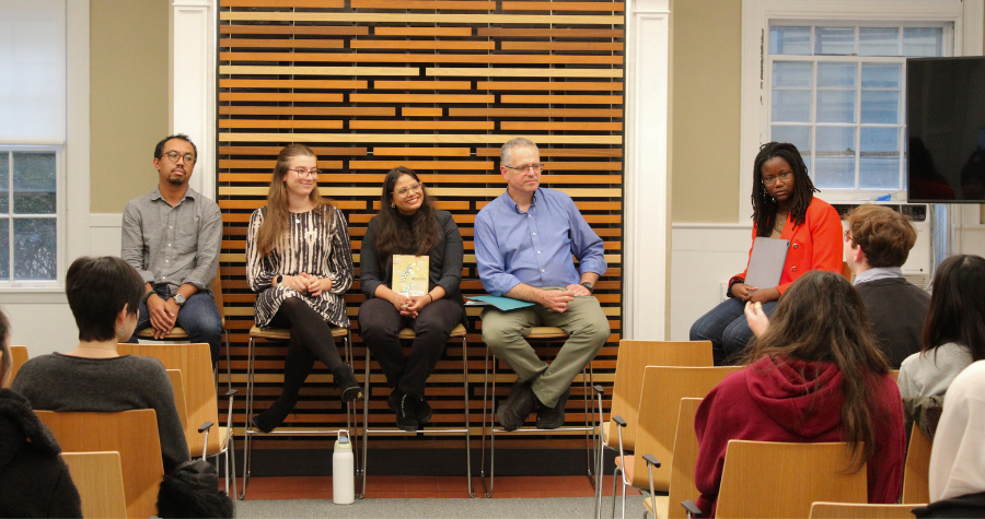 4 Panelists looking at student asking a question.